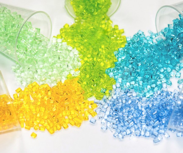 several dyed transparent polymer granulates